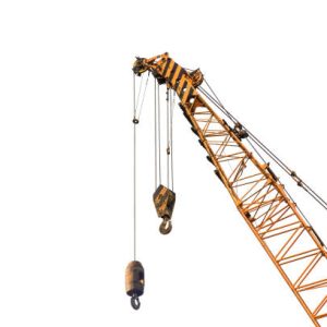 Close-up industrial big crane with steel hook for work on construction building outdoor site, isolated on white background